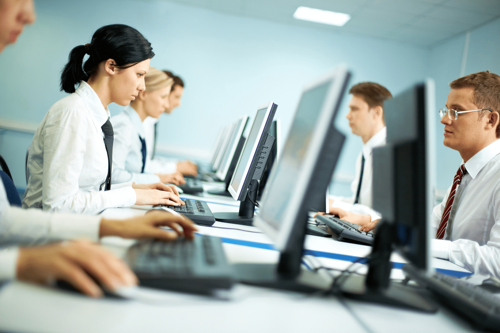 Workers sat at desk